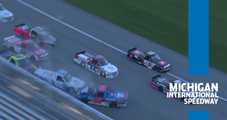Multiple trucks involved in crash on frontstretch at Michigan