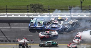 Austin Dillon avoids wreck, makes late race push to clinch playoff berth