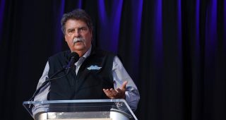 Mike Helton walks the Hall of Fame red carpet as the 2023 Landmark Award winner
