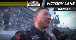Send it! Reddick reacts to three-wide move to win at Kansas