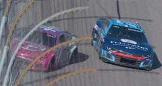 Contact from Hocevar sends Yeley into wall, spinning in the grass