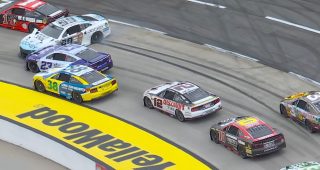 Contact from Wallace sends Suárez sliding for first caution