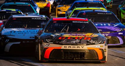 Zane Smith's No. 38 Ford leads the way alongside the No. 12 of Ryan Blaney at EchoPark Speedway