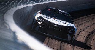 In-car: Reddick charges back to score wild Kansas win