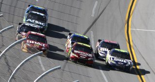 Three-wide! Jimmie Johnson wins epic 2011 Talladega battle