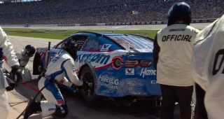 Larson spins out, crashes into outside wall