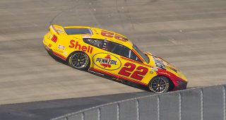 Hard hit: Logano spins, wrecks to bring out caution
