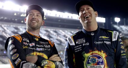 Chase Briscoe and Kyle Busch look on during NASCAR Cup Series qualifying at Daytona.