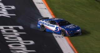 Larson slides through infield grass late at EchoPark