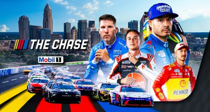 NASCAR Cup Series cars race at Charlotte Motor Speedway.