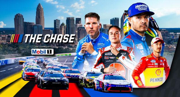 NASCAR Cup Series cars race at Charlotte Motor Speedway.
