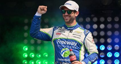 Spire Motorsports driver Daniel Suárez pumps his fist during NASCAR driver intros.